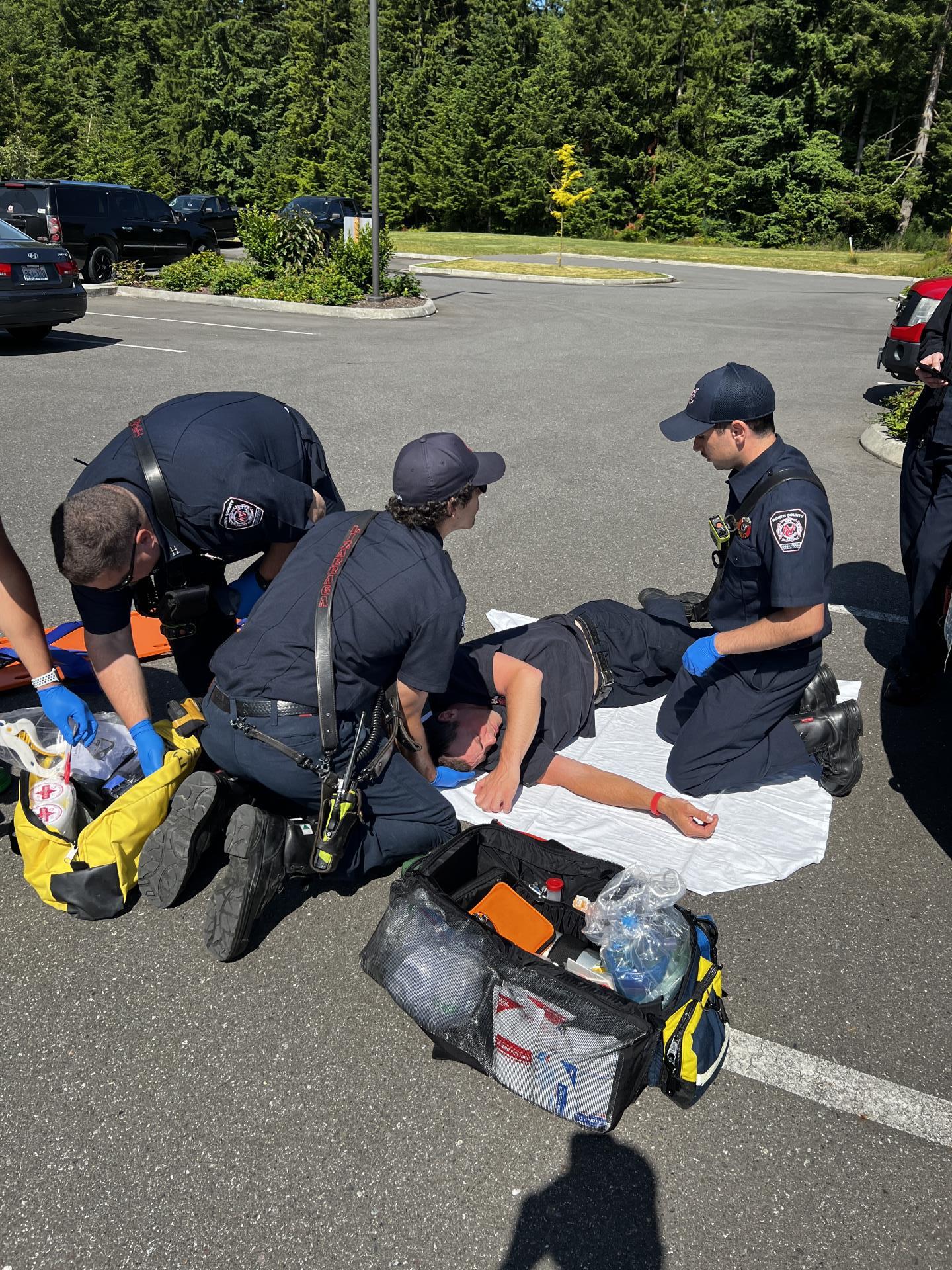 Crews backboarding outside training